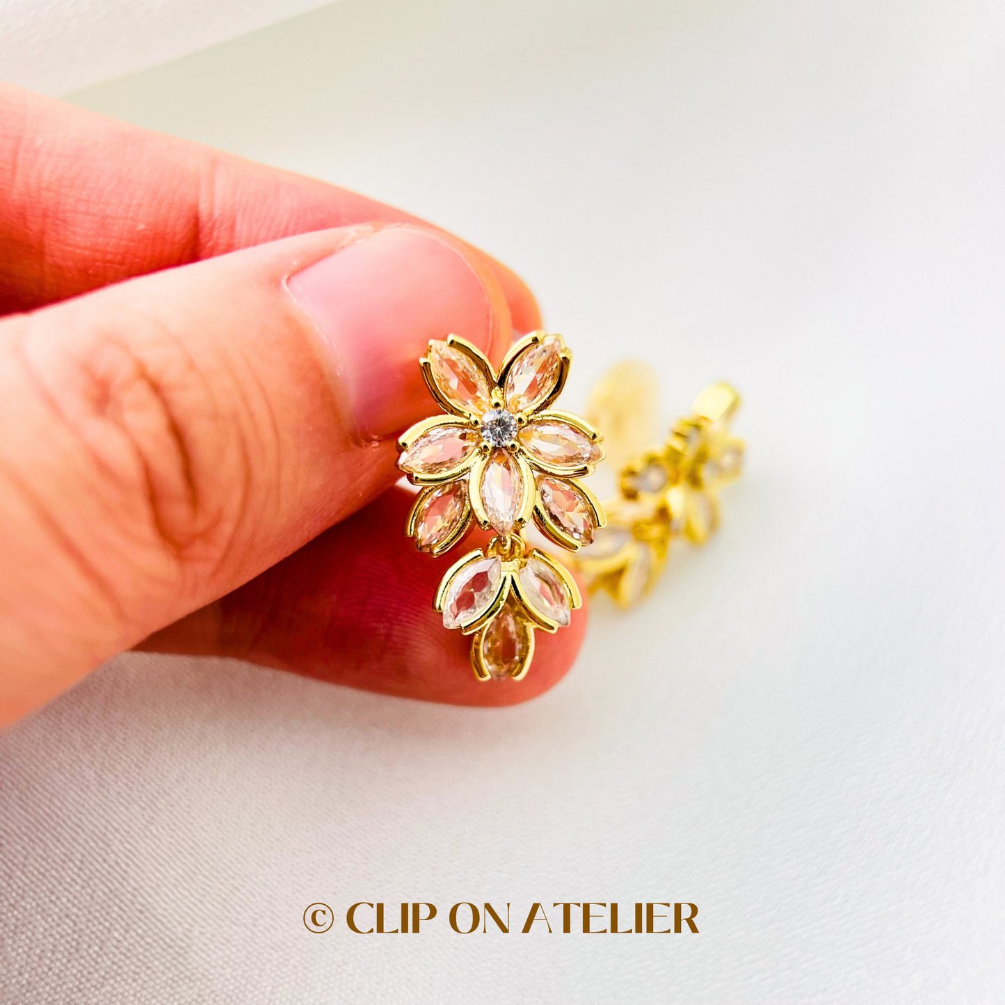 Luxe Diamond Flower Dangle Clip On Earrings