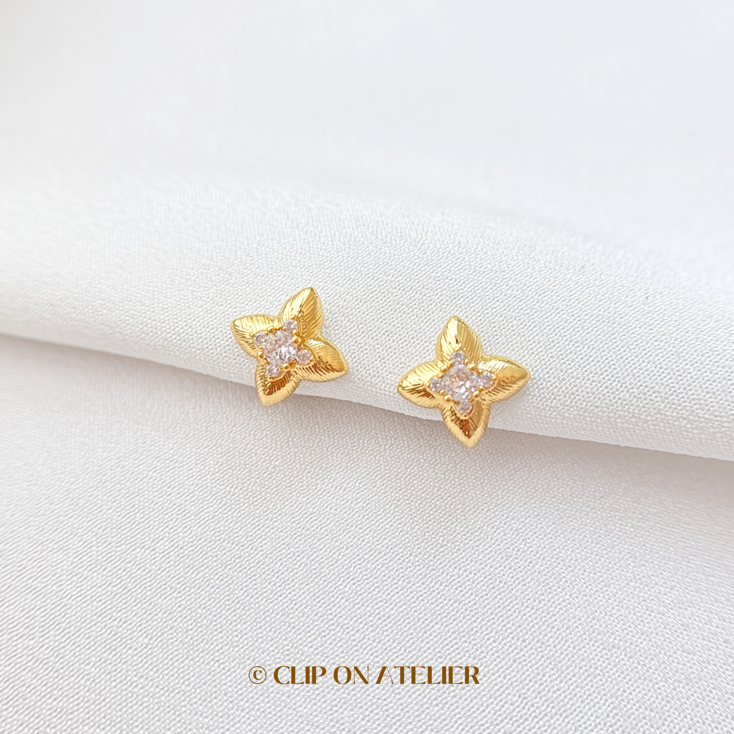 Celestial Four-pointed Star CZ Diamond Floral Clip On Earrings