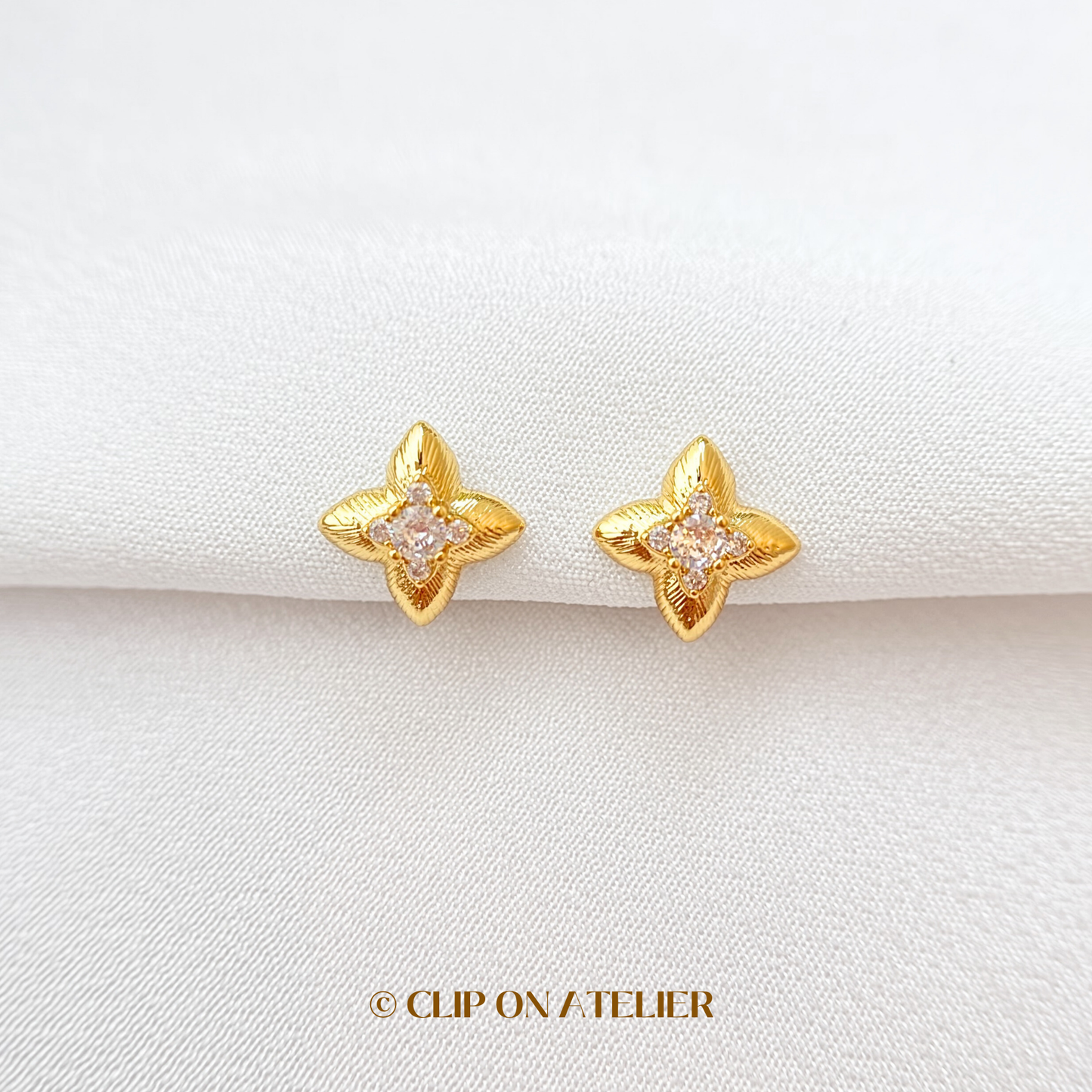 Celestial Four-pointed Star CZ Diamond Floral Clip On Earrings