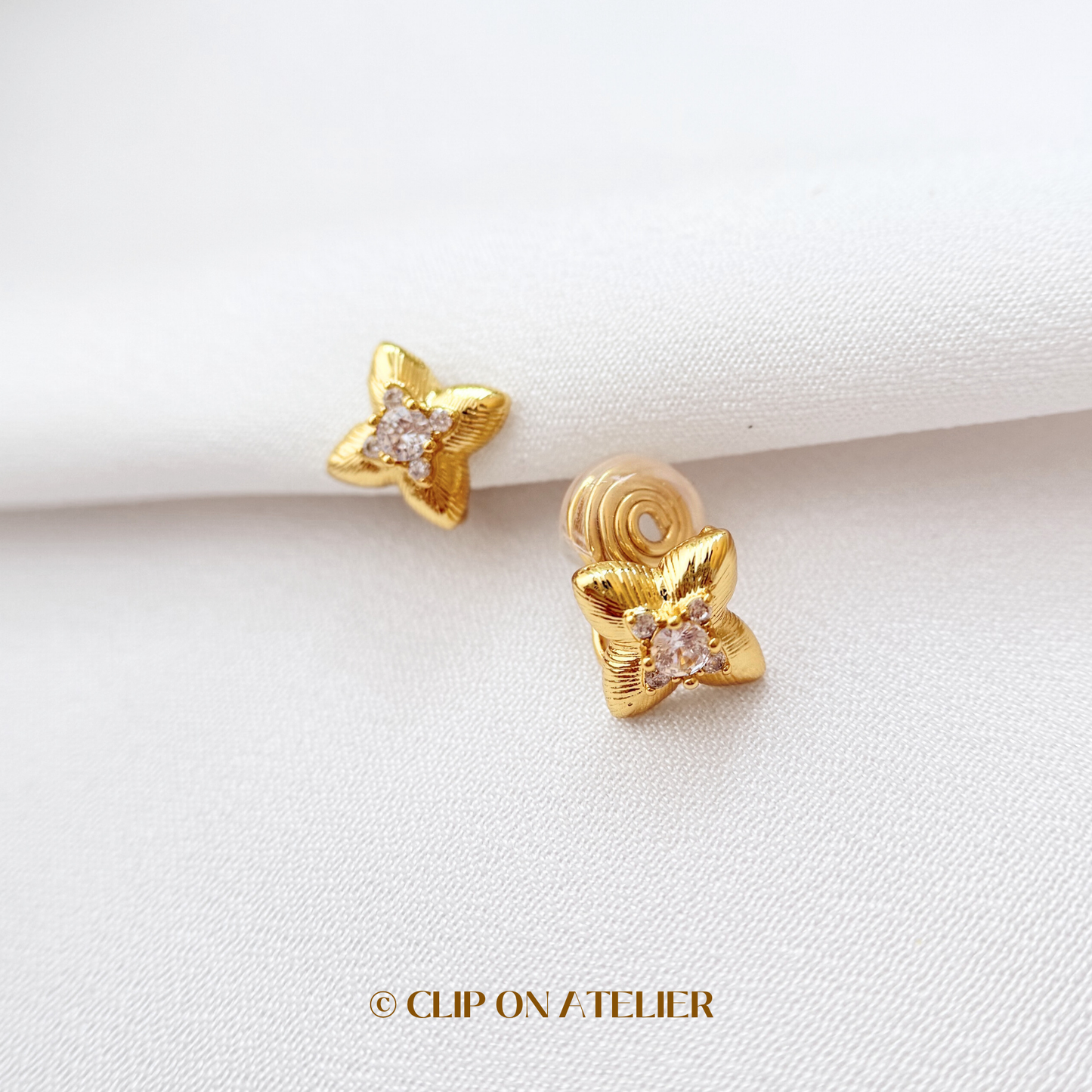 Celestial Four-pointed Star CZ Diamond Floral Clip On Earrings