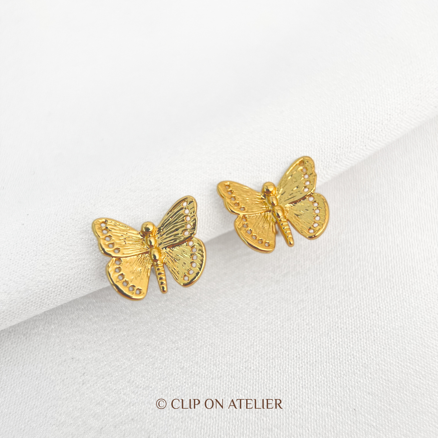 Refined Gold Butterfly Clip On Earrings