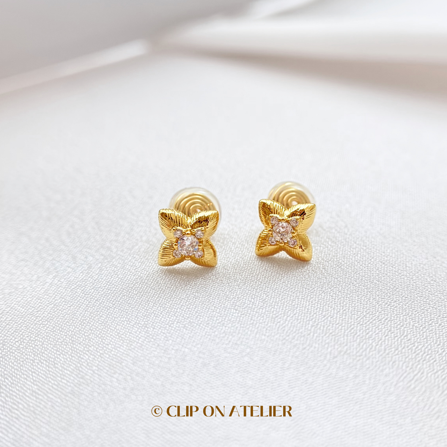 Celestial Four-pointed Star CZ Diamond Floral Clip On Earrings