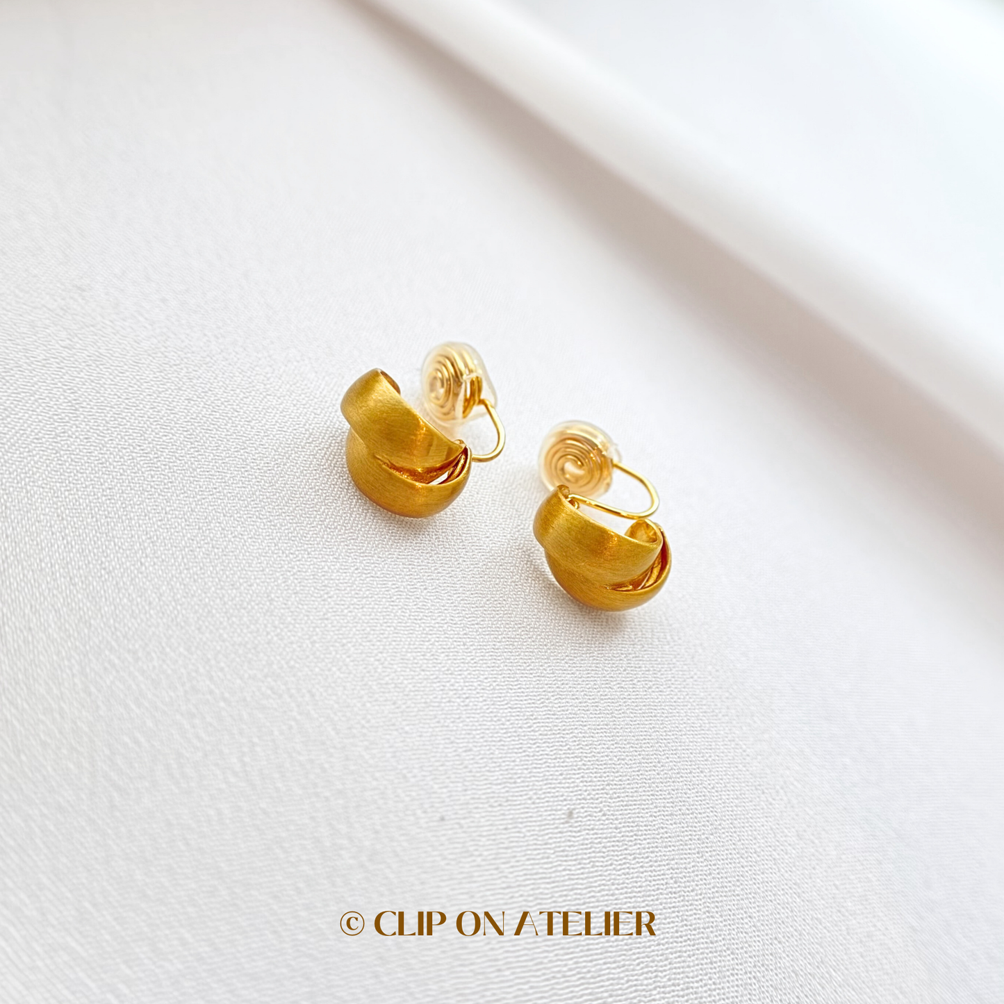 Twisted Matte Gold C-Shaped Hoop Clip On Earrings