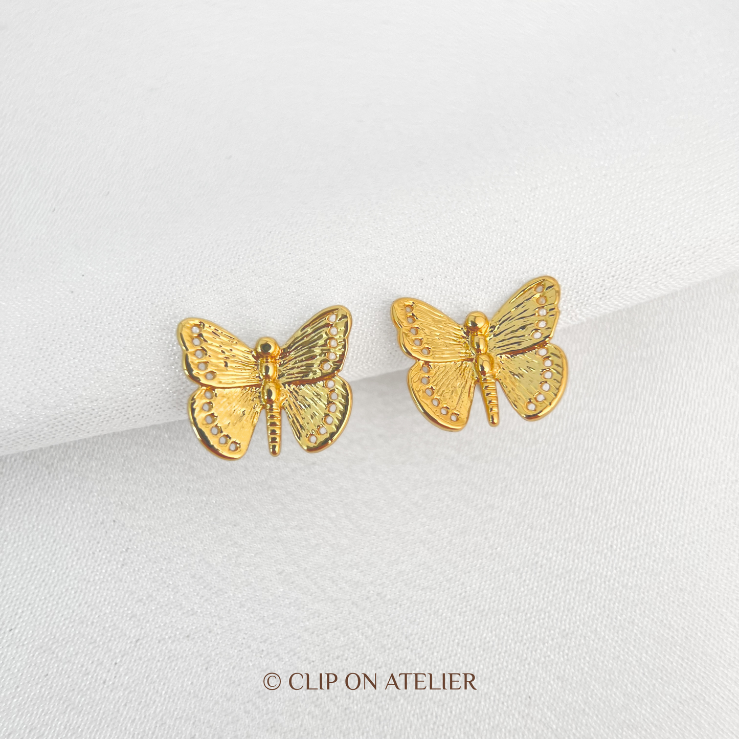 Refined Gold Butterfly Clip On Earrings