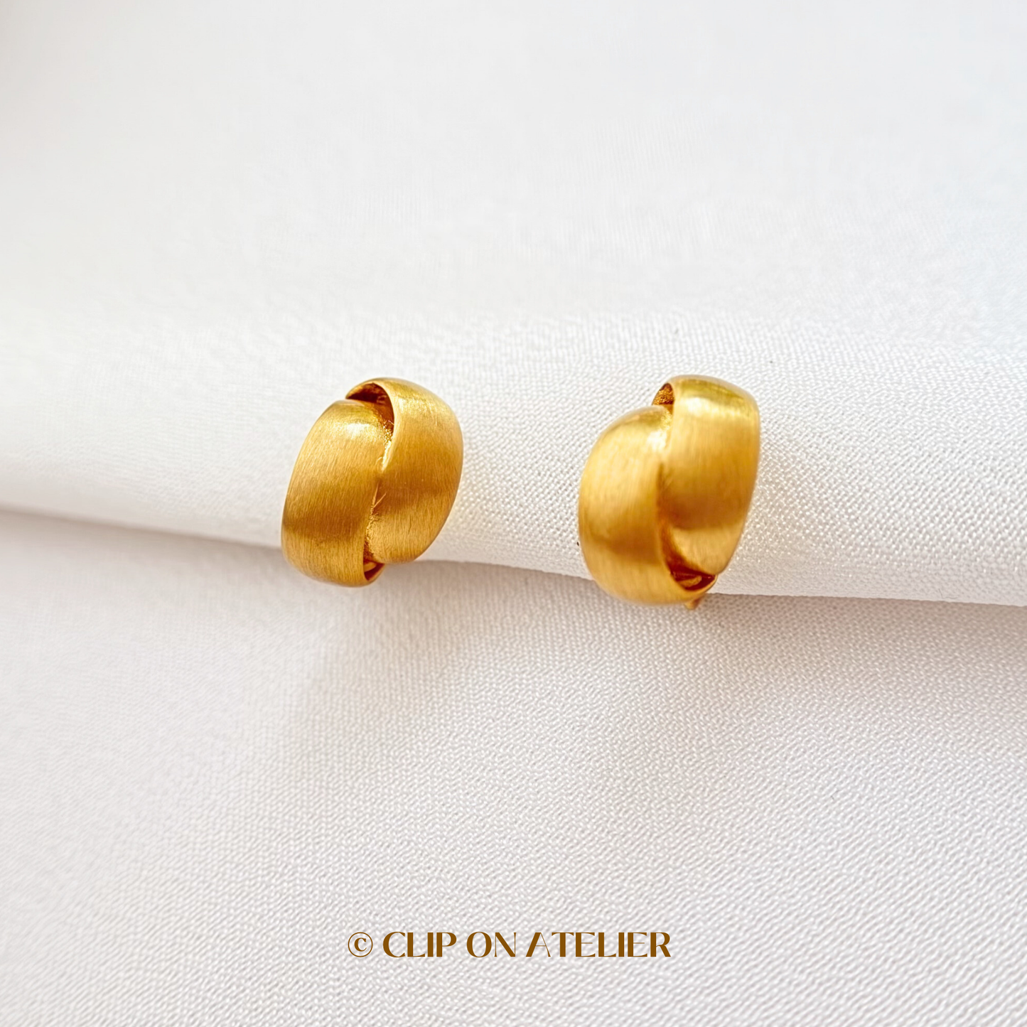 Twisted Matte Gold C-Shaped Hoop Clip On Earrings