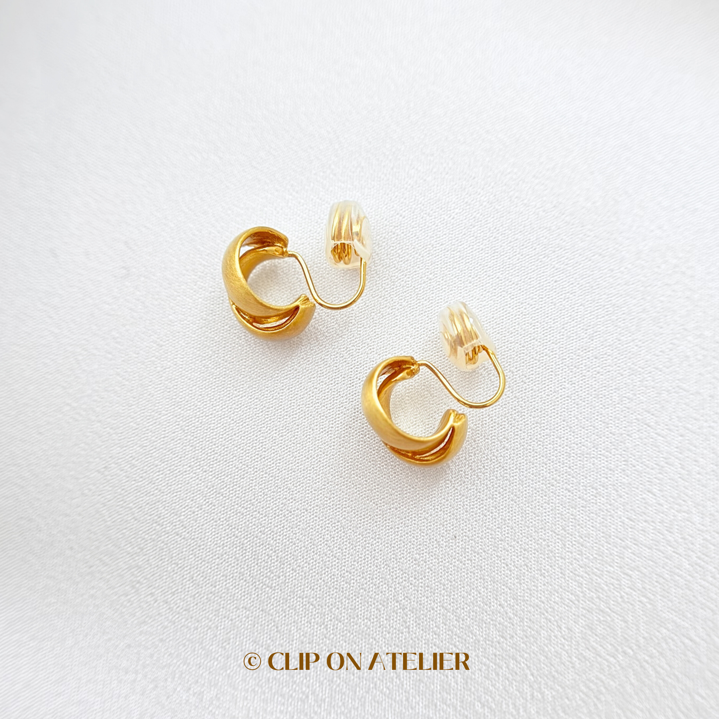 Twisted Matte Gold C-Shaped Hoop Clip On Earrings