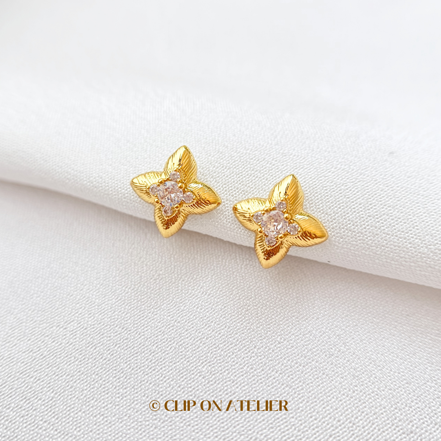 Celestial Four-pointed Star CZ Diamond Floral Clip On Earrings