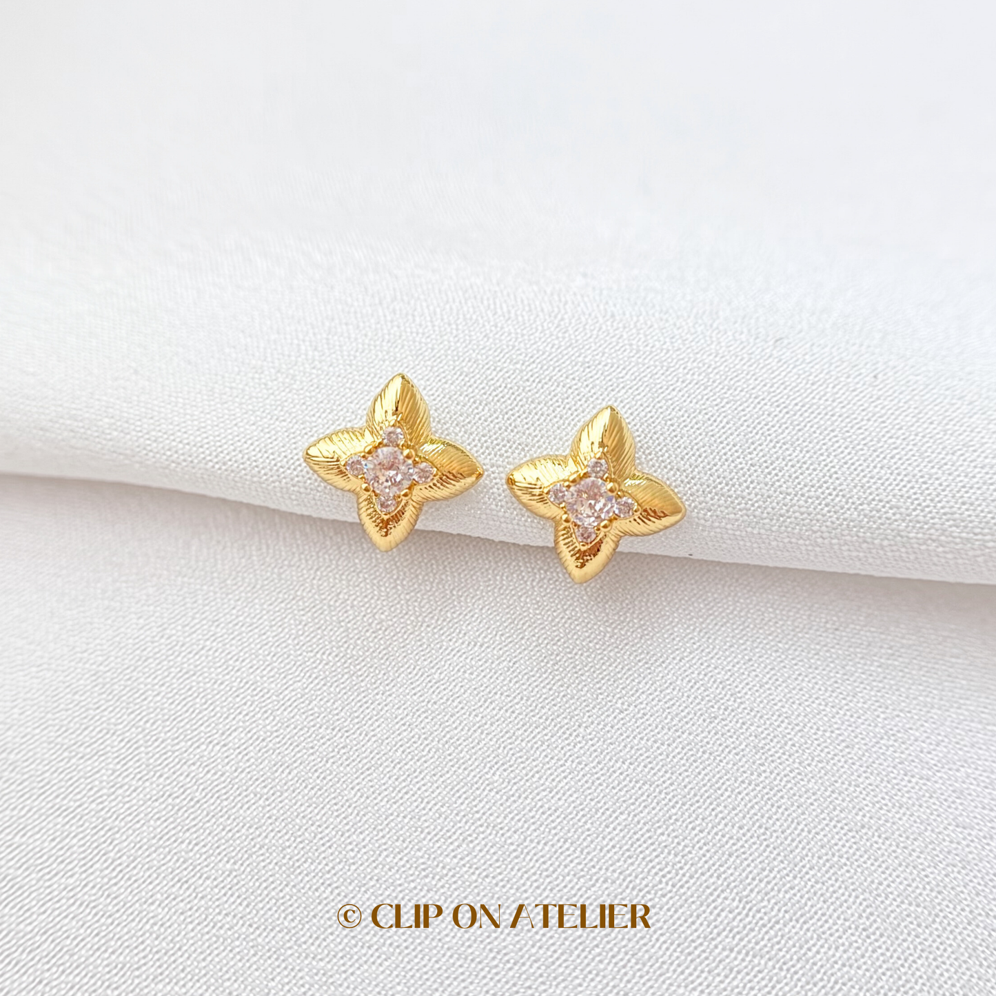 Celestial Four-pointed Star CZ Diamond Floral Clip On Earrings