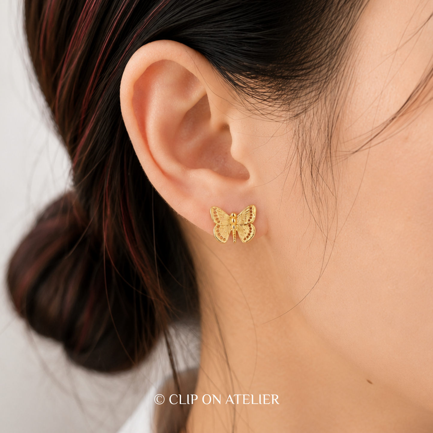 Refined Gold Butterfly Clip On Earrings