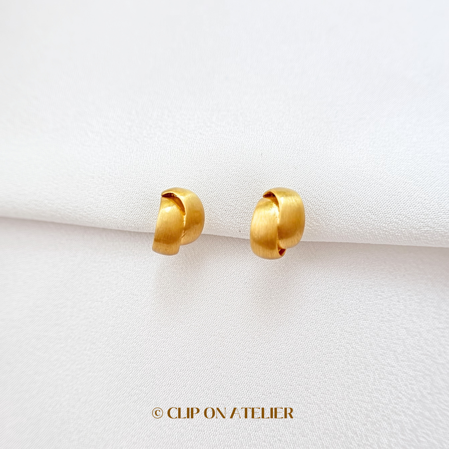 Twisted Matte Gold C-Shaped Hoop Clip On Earrings