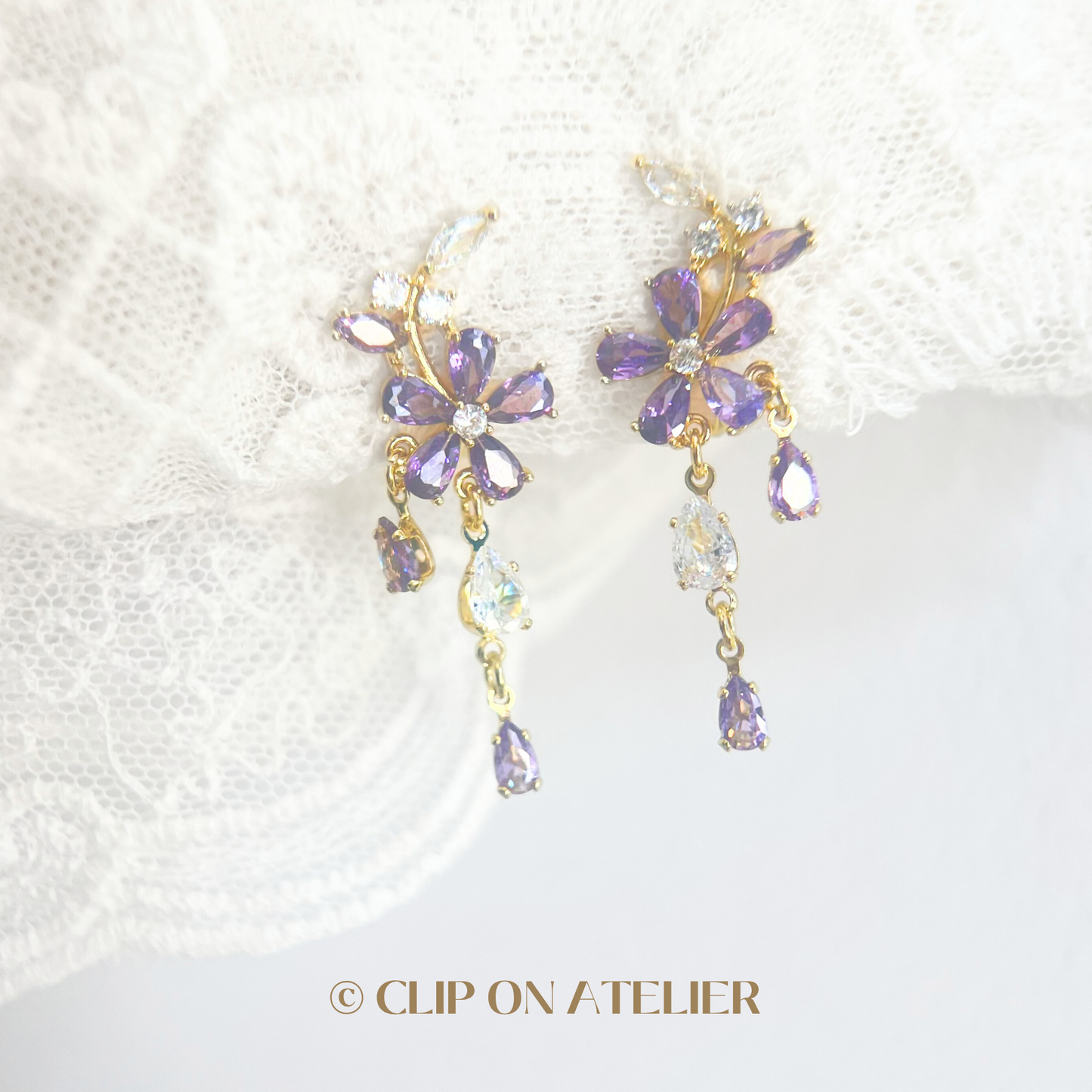 Luxe Purple Diamond Flower Dangle Clip On Earrings
