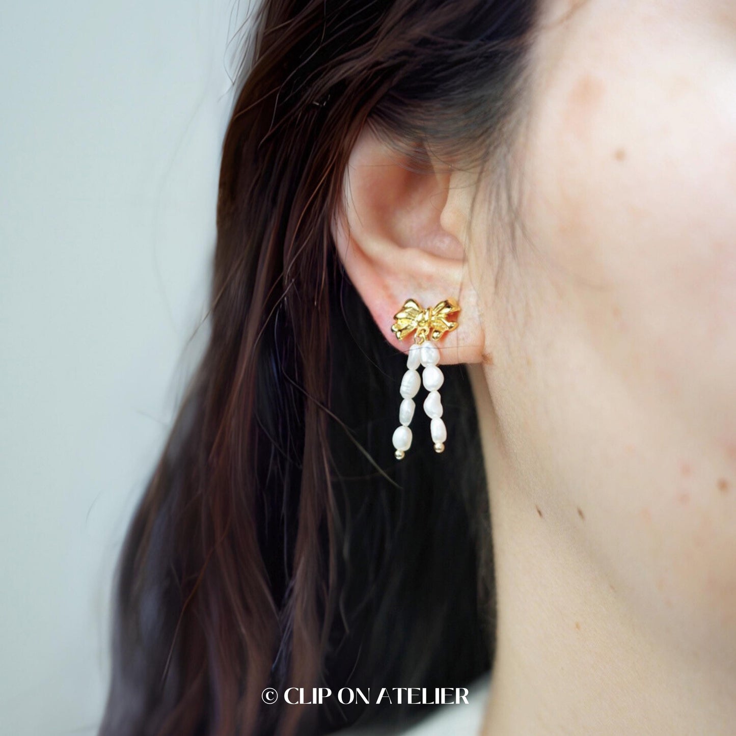 Pearl Bow Tie Clip On Earrings