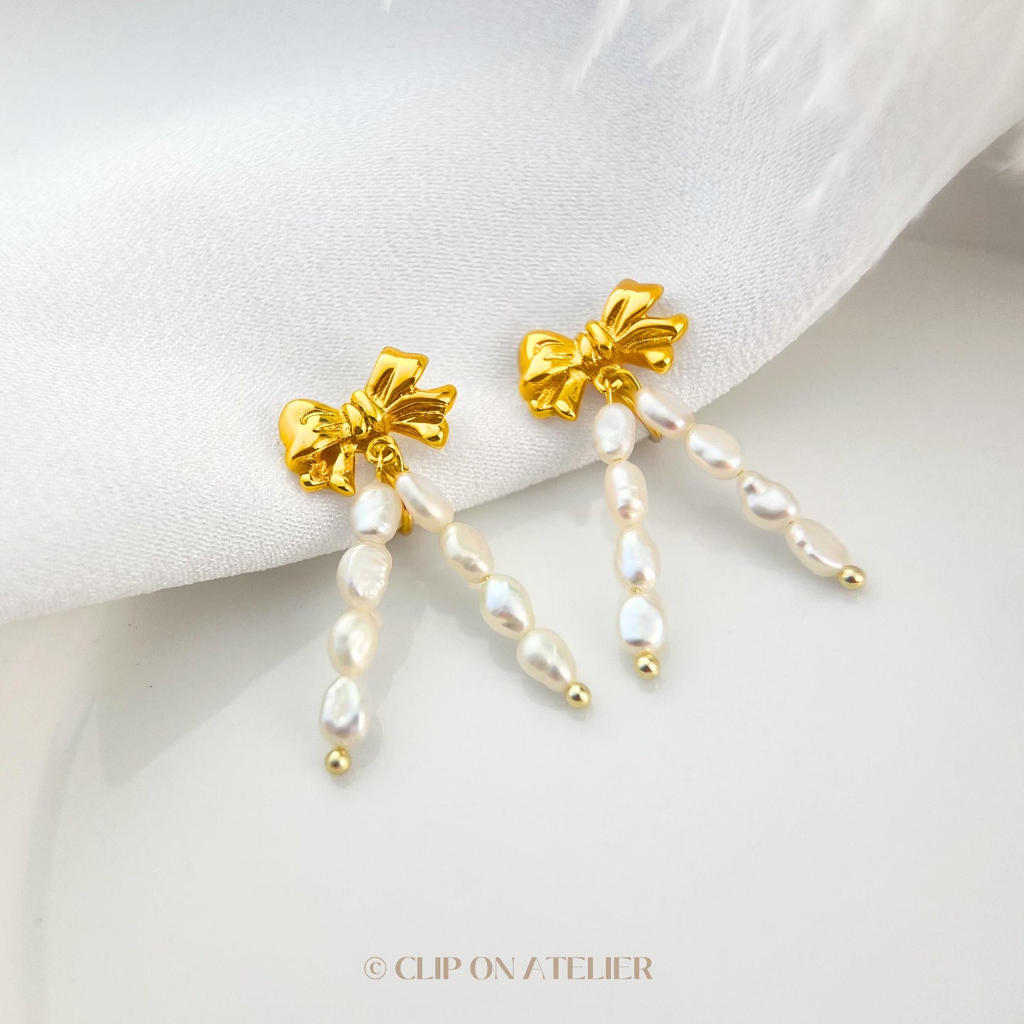 Pearl Bow Tie Clip On Earrings